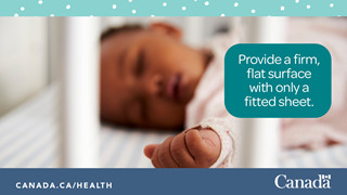 Photo of a baby sleeping on their back alone in their crib.