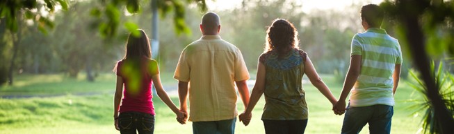 Family walking hand in hand