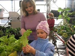 A student picking vegetables