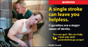 Man paralyzed by a stroke getting assistance in the bathroom by a male attendant.